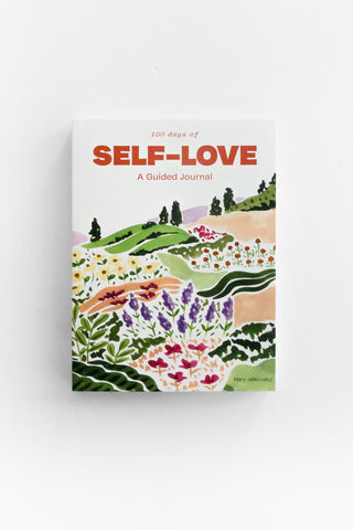 Book titled '100 Days of Self-Love: A Guided Journal' with a colorful cover design on a white background