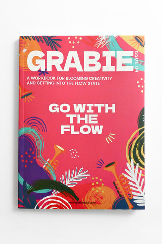 Colorful workbook titled 'GRABIE' with abstract designs on a white background