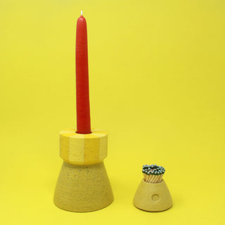 Candle holder and match striker