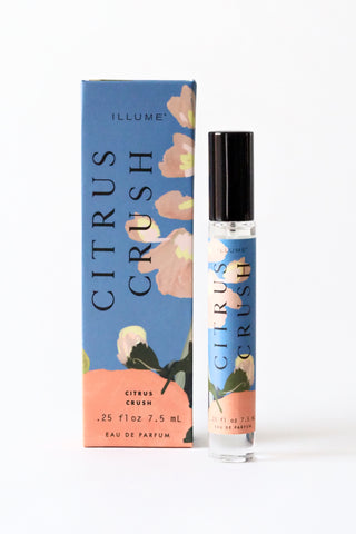 Perfume bottle and packaging of 'Citrus Crush' by Illume on a white background