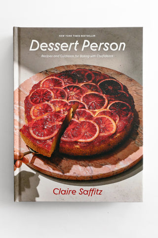 Book cover of 'Dessert Person' by Claire Saffitz featuring a cake with blood orange slices.