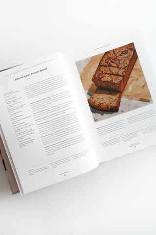 Open cookbook showing a recipe for almond butter banana bread.