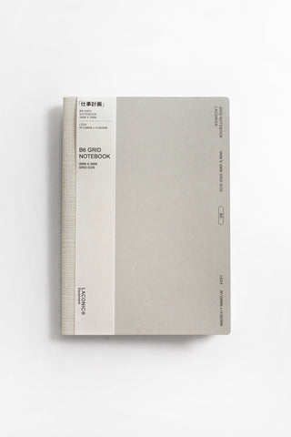 Grid notebook with a white cover on a light gray background