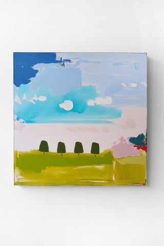 Colorful abstract landscape painting with trees and a blue sky, on a white wall