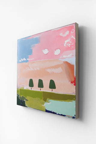 Abstract painting of a landscape with trees and a pink sky on a white wall