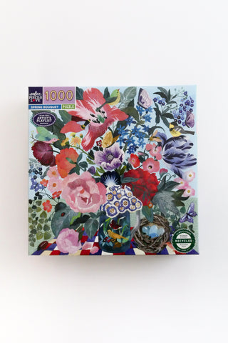 Floral puzzle box with colorful flowers and a bird on a white background