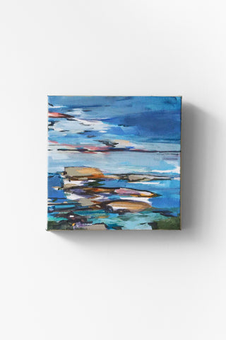 Abstract painting of an ocean horizon with a white background
